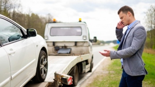 Contacting A Locksmith vs. Calling A Towing Service1