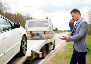 Contacting A Locksmith vs. Calling A Towing Service1